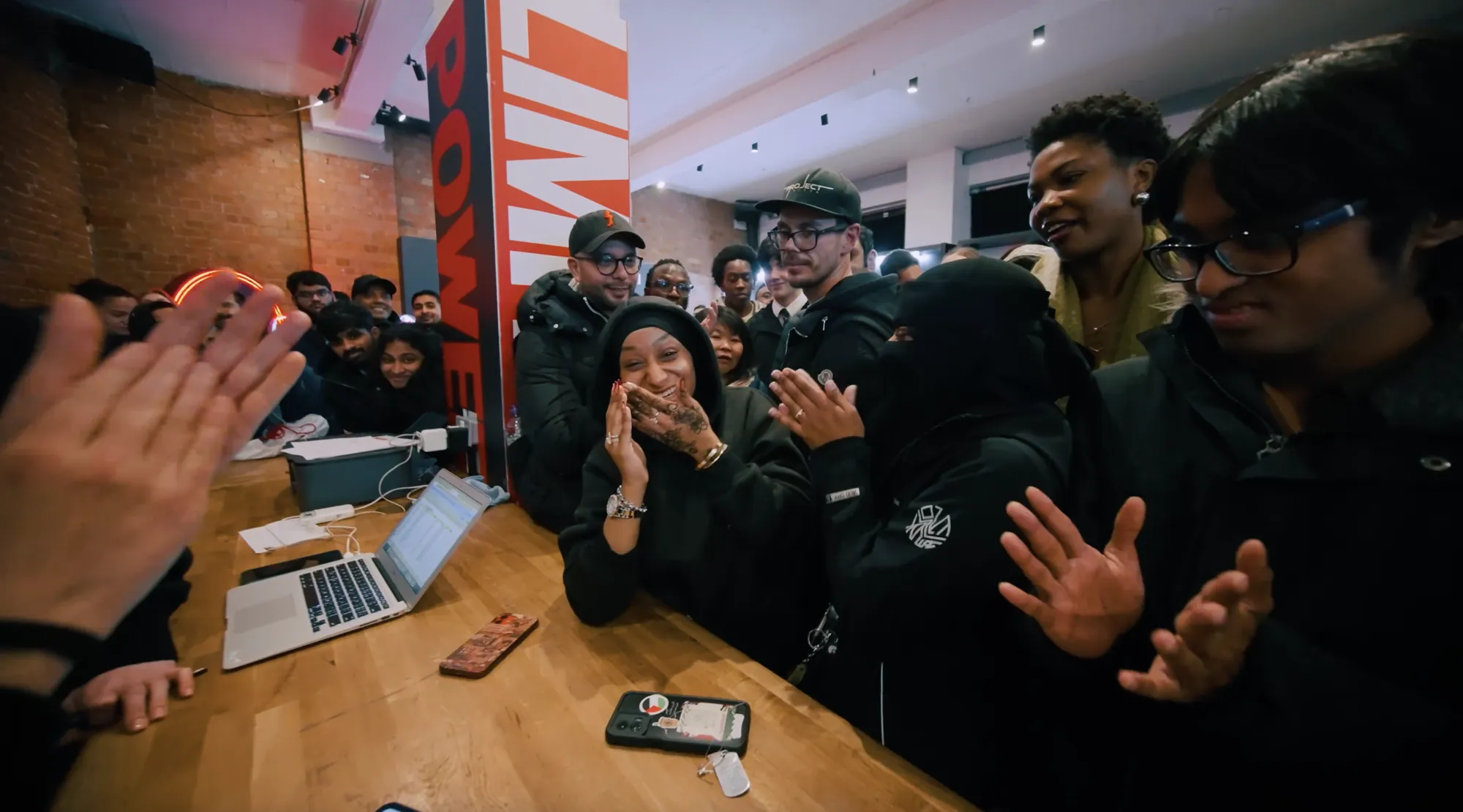 A crowd trying the OnePlus 15 at one of the pop-ups